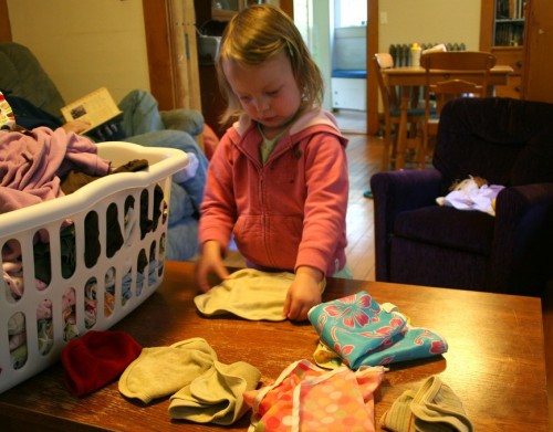 Do you have a child who doesn't believe in putting things away? Most kids aren't born tidy but you can absolutely teach them how to clean up. Kids can pick up toys, clothes, and help in the kitchen. This post shows you how. 